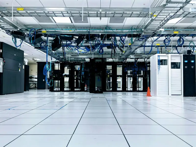 Rows of network cabinets and cabling in a data centre